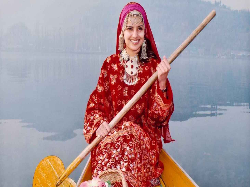 A girl on a Shikara in Dal Lake