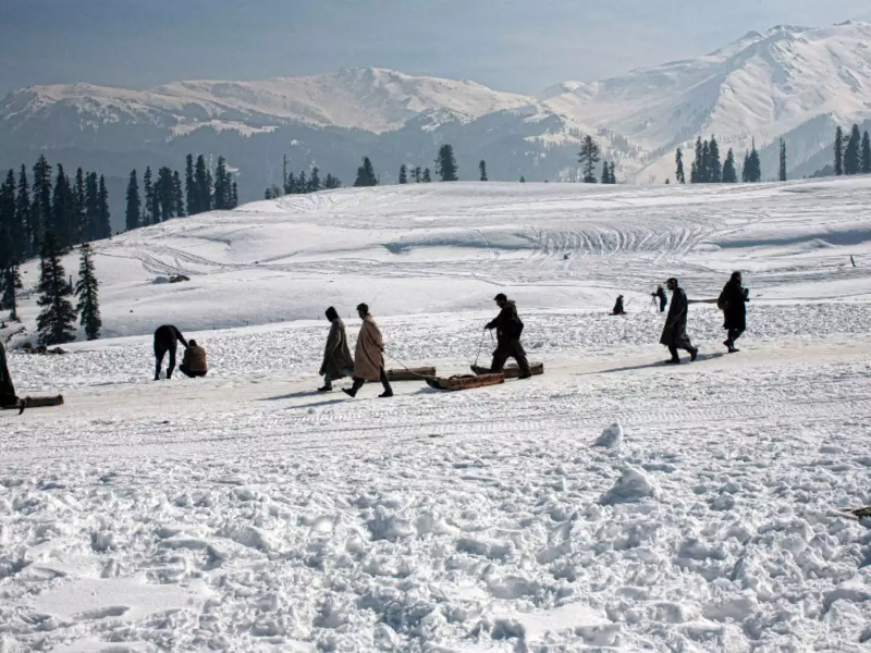 Tourists are ready to slide on the slopes