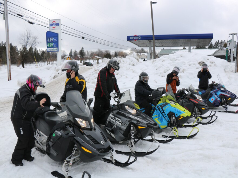 Three snowmobiles 