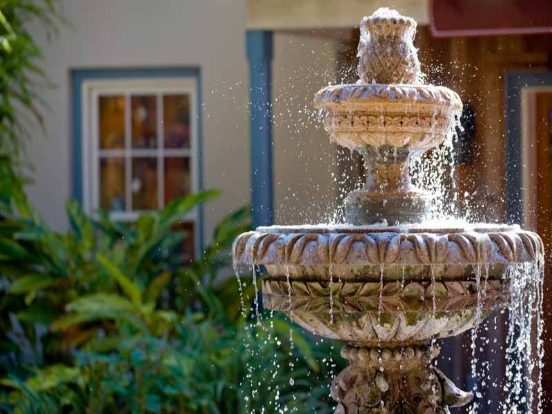 Fountains are visible in the water channels 